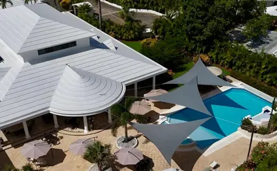 an overhead view of a building with a swimming pool at La Pala Suites in Las Terrenas