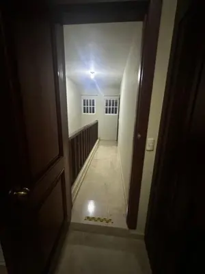 a view of a hallway from a room with a door at Espacioso Casa en Puerto Plata cerca de La Playa 4 camas 3 baños Agua caliente Aire condicionado Wi-Fi in Puerto Plata