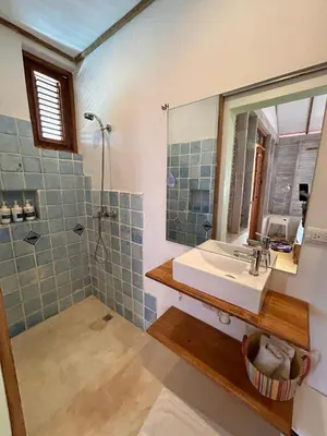 a bathroom with a sink and a shower at Clave Verde Ecolodge in Las Terrenas