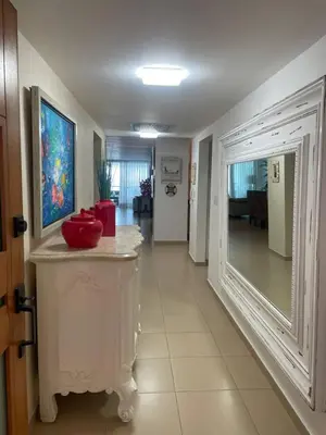 a room with a hallway with a large window at Luxury Penthhouse Frente Al Mar in Juan Dolio