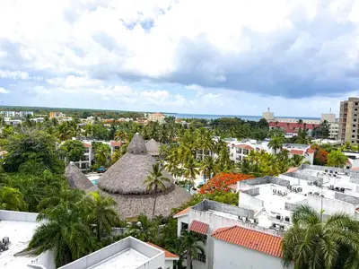 a view of the city from the roof of a building at Apartamento en Boca Chica T2 707 in Boca Chica