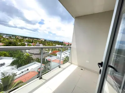 an apartment balcony with a view of the city at Apartamento en Boca Chica T2 707 in Boca Chica