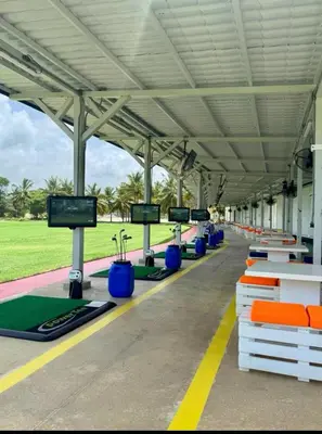 a row of exercise machines in a building with monitors at Swim-Up Paradise, AirBB for more info in Punta Cana