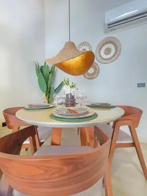 a table with a hat on top of it at Garden Breeze Penthouse & Pool View l Mistral 401 in La Laguna