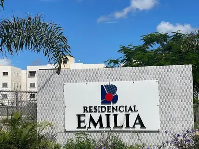 a sign for a hospital in front of a building at Olas del caribe DR in Santo Domingo