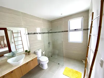 a bathroom with a sink and a toilet and a shower at Cocotal Beach Pool and Golf course Punta Cana RD in Colorado