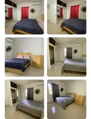 a series of four pictures of a bedroom with two beds at Casa veraniega en samana in Santa Bárbara de Samaná