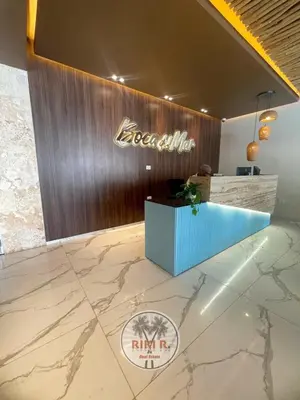 a lobby of a hotel with a sign on the wall at Boca del Mar III Apartment 724 in Boca Chica