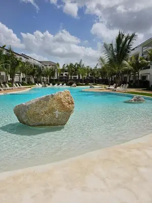 a large rock in the middle of a swimming pool at Estrella Garden Condos Dominicus l Meridiana 204 in La Laguna