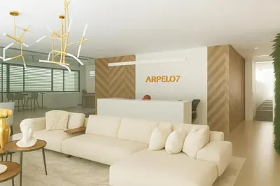 a living room with a white couch and a table at Upscale City Center Condo Pool in Santo Domingo