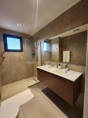 a bathroom with a sink and a shower at Luxury Beachside Retreat & Private Plunge Pool in Punta Cana
