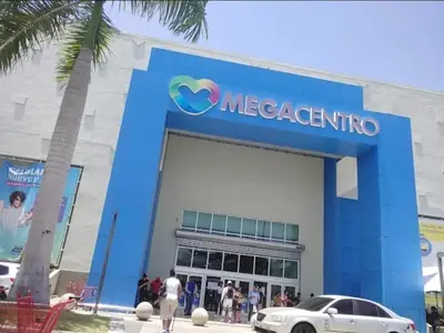 a meccano store with a car in front of it at Relaxing and Serene Guest Room in Cancino