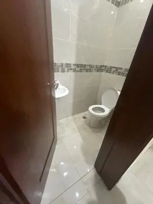 a bathroom with a toilet and a sink at Modern Getaway with Private Pool, Montecristi in Villa Vásquez