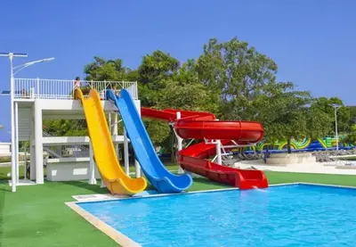a water park with a slide and a pool at Bubble Glamping, Family 2 beds, we have a 12 units like this in Sosúa