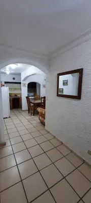 a kitchen and dining room with a tile floor at Puerto Plata Home in San Felipe de Puerto Plata