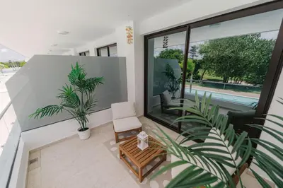 an overhead view of a living room with plants at Sea Escape Casa Tortuga @ Cana Rock 1 Bdrm Bliss in Punta Cana