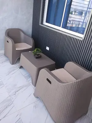 a room with two chairs and a table and a chair at Cozy 2 Bedroom Apartment Boca Chica in Boca Chica
