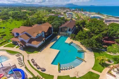 an aerial view of a resort with a swimming pool at Villa Solana in Oceanfront Com Sosua Ocean Village in Sosúa