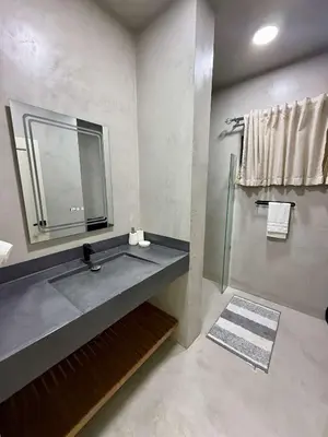 a bathroom with a sink and a mirror at Coral Villa in Oceanfront Comm Sosua Ocean Village in Sosúa
