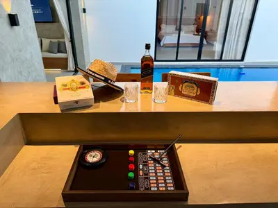 a remote control sitting on top of a table at Coral Villa in Oceanfront Comm Sosua Ocean Village in Sosúa