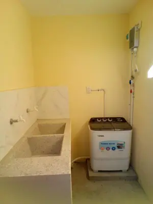 a small kitchen with a sink and a stove at Mi refugio 2 in San Fernando de Monte Cristi
