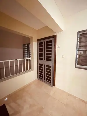 an empty room with a door and a balcony at Cerca del aeropuerto los frailes I in Los Frailes