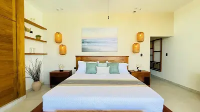 a bedroom with a large bed in a room at Villa Solana in Cabrera Dominican Republic in Cabrera