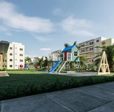 a playground with a slide in front of a building at Residencial cayena del este Santo Domingo este in La Grúa