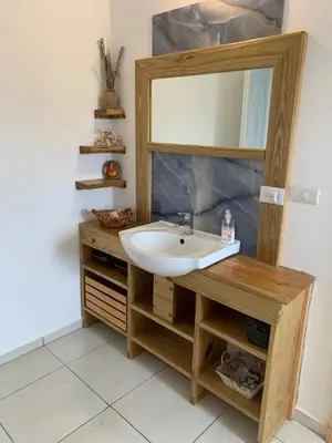 a bathroom with a sink and a mirror at Villa Brisa del Caribe in Las Terrenas