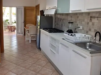 a kitchen with a sink and a counter top at Apartamentos Cayuco 28 in La Laguna