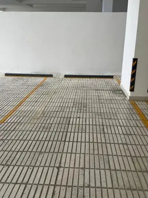an empty room with a tile floor and white walls at Chic City Apartment Walk to Everything! in Santo Domingo
