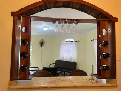 a large mirror in a room with a dining room at Desconecta para volver a conectar - La bebida tiene costo adicional in Miches