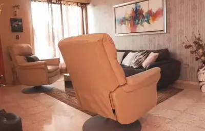 a living room with a couch and a chair at Casa club by mama nelsy in Santa Cruz de El Seibo