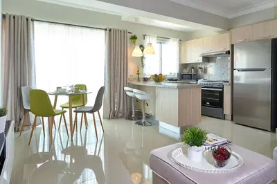 a large kitchen with a table and a counter top at Erasmo in Colorado