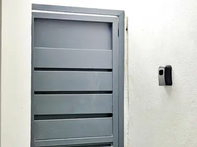 a blue door on the side of a building at Mini Hogar 4 in Colorado