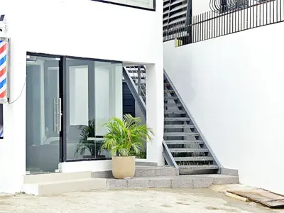 a house with a staircase and a potted plant at Mini Hogar 2 in Colorado