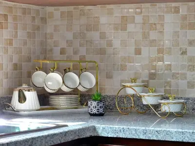 a kitchen with white pots and pans on a counter at Casa Elegante in Colorado