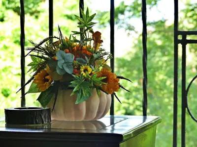 a vase filled with flowers sitting on a table at Cofresi, Puerto Plata in Colorado