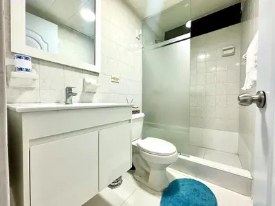 a bathroom with a toilet and a sink and a shower at Cofresi, Puerto Plata in Colorado