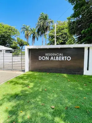 a sign that readsresurrectionario don albertino at Modern 3BR with private pool near the beach in Puerto Plata