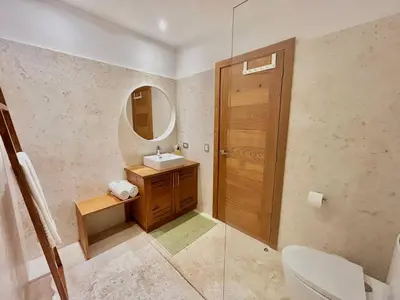 a bathroom with a sink and a mirror at Villa Hazel in Las Terrenas