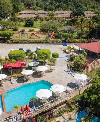 an aerial view of a pool at a resort at Jarabacoa River Club & Resort in Jarabacoa