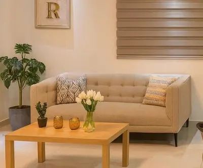 a living room with a couch and a coffee table at Boca chica playa y sol in Boca Chica