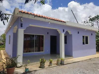 a model of a house with a garage at Hermosa casa de campo in Juana Vicenta