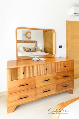 a wooden dresser with a mirror on top of it at Estrella Garden Shaula 304 New Modern Penthouse in La Laguna