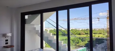a view of a staircase from a house with windows at Penthouse in Cana Rock in Punta Cana