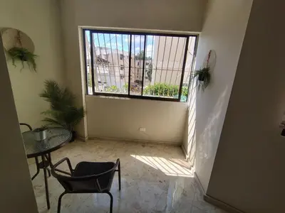 an empty room with a table and a window at Private and comfortable double room in Santo Domingo