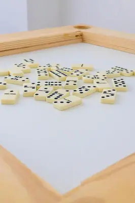 a game of dominoes on a bed at Couples PH @ Cana Rock Star with Great Golf Views in Punta Cana