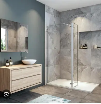 a bathroom with a glass shower and a sink at Recidencial in Mendoza