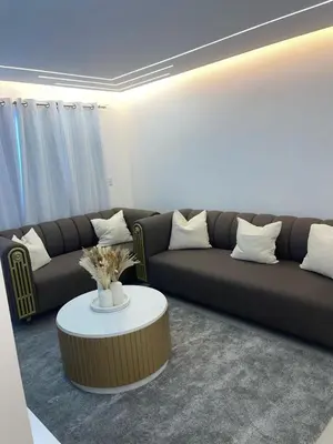 a living room with a couch and a coffee table at Apartment in the heart of Santiago in Santiago de los Caballeros